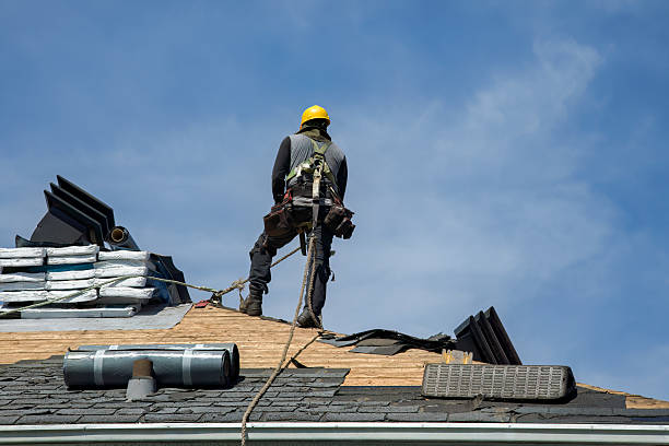 Professional Roof Replacement technician working in Huntley, MT